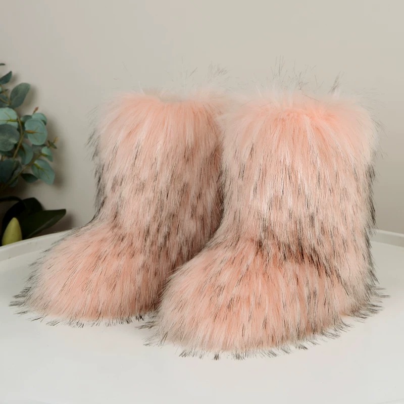 Pink faux fur snow boots.