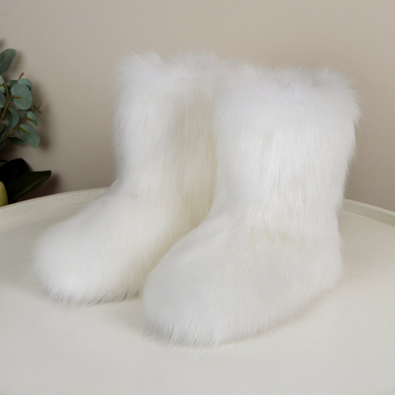 Snow-white faux fur snow boots.